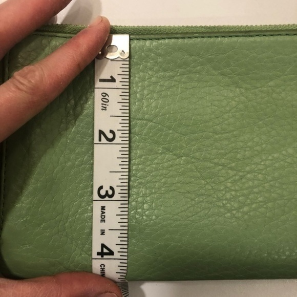 Coach double zipper green leather wristlet clutch